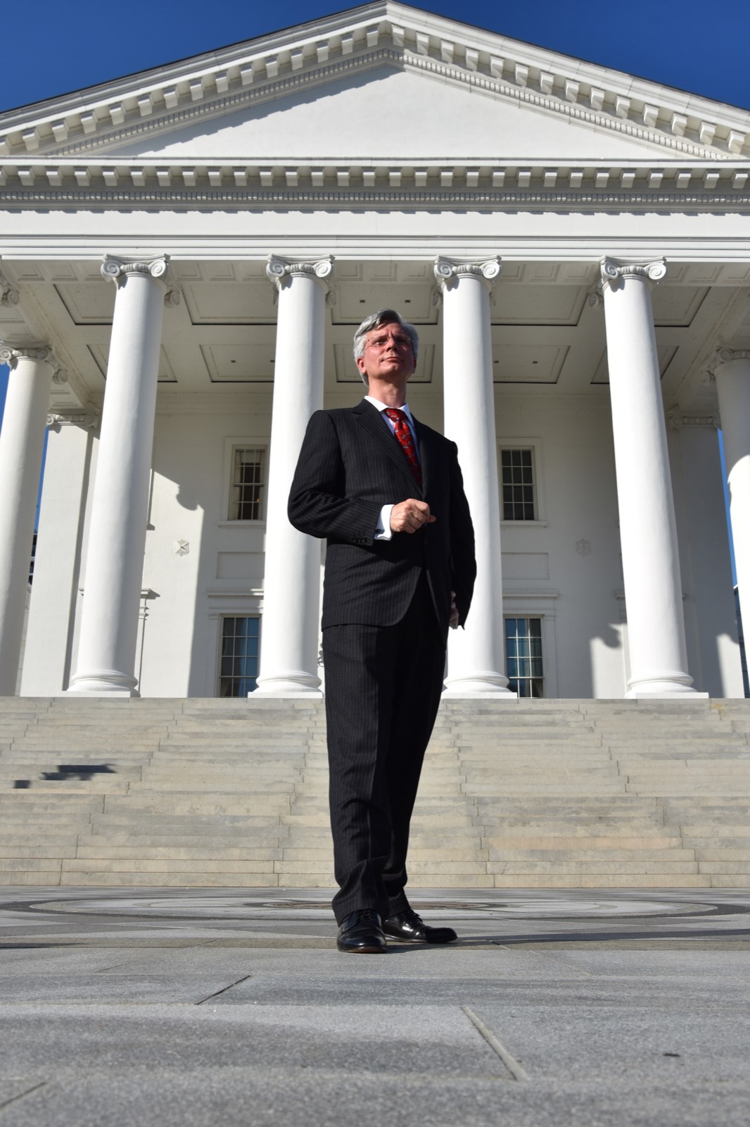 Robert Murray standing in front of the Virginia State Capitol in Richmond