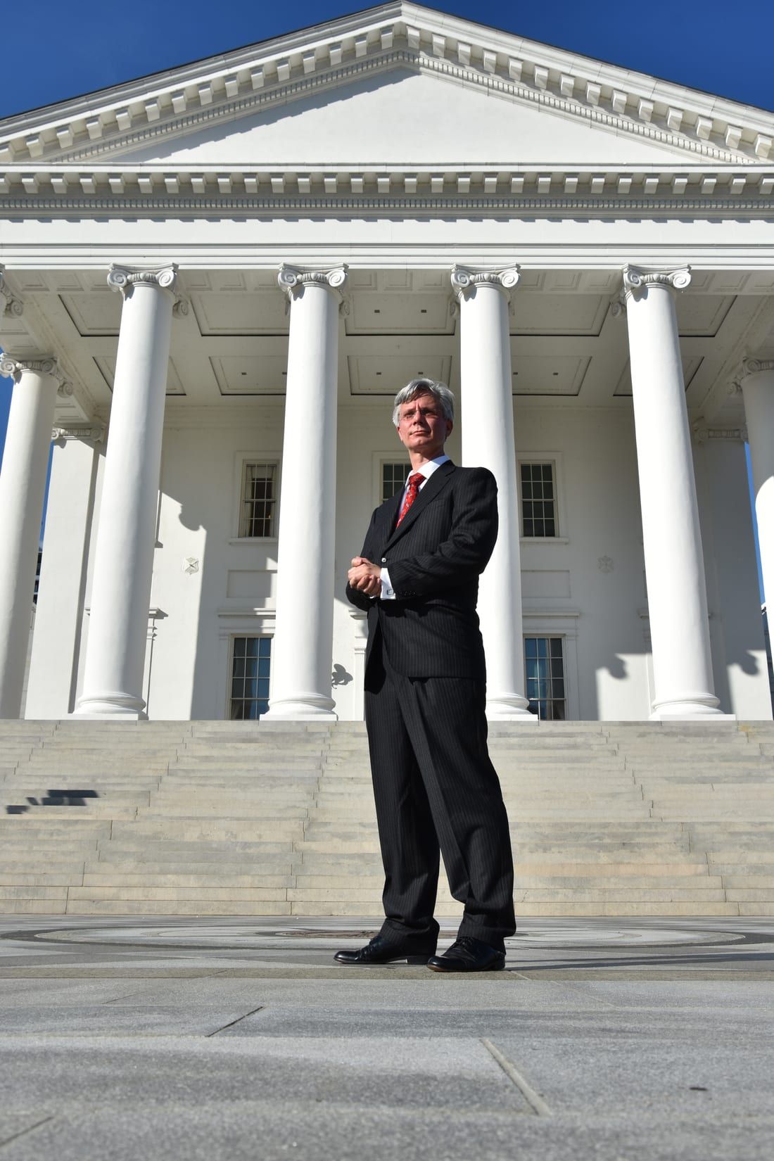 Robert Murray standing in front of the Virginia State Capitol in Richmond